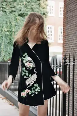 RIXO Iris Tiger Wrap Mini Dress Black Size UK 12 for rent on The Volte - image 3