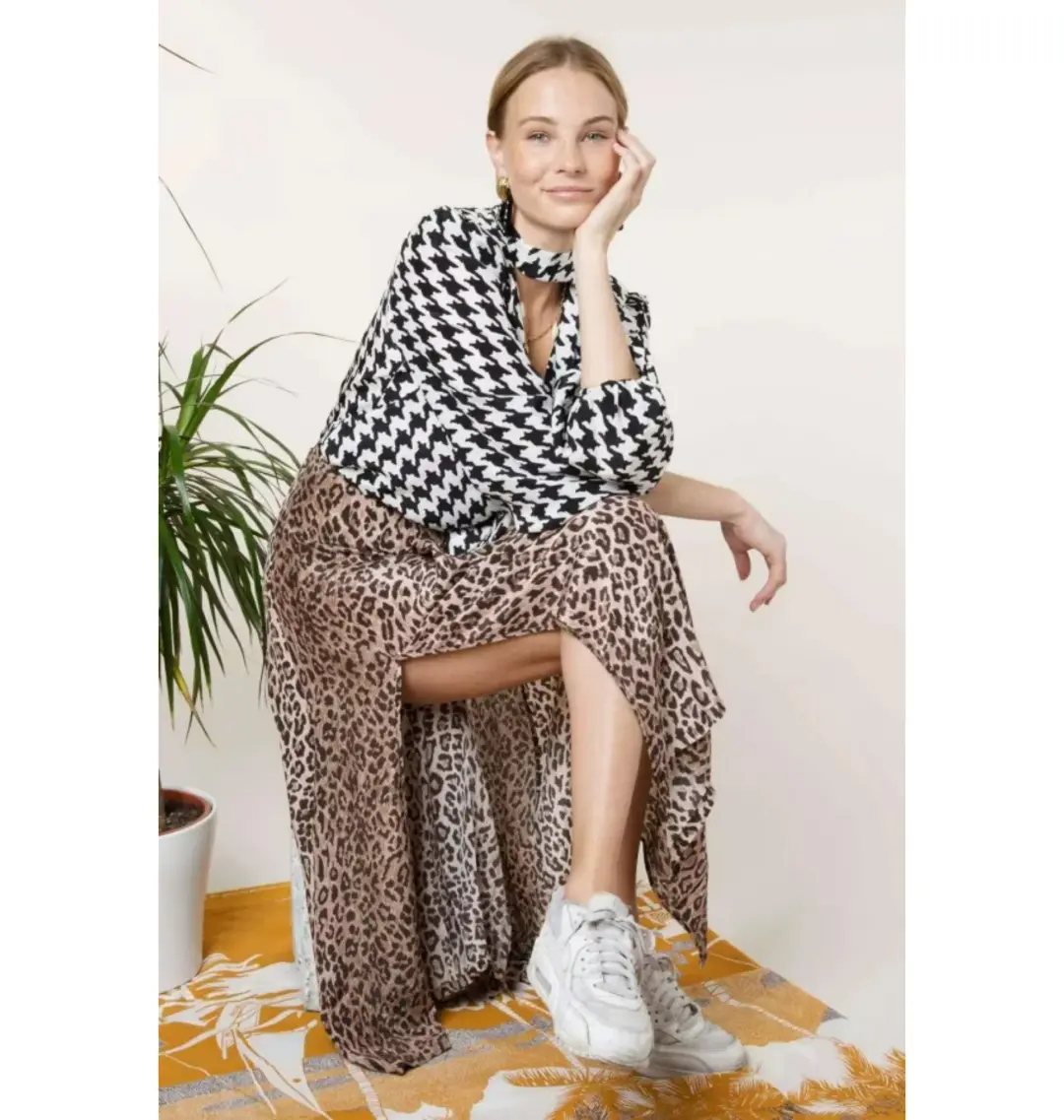 Rixo Georgia Silk Midi Skirt in Leopard Size UK 12 for rent on The Volte - main image