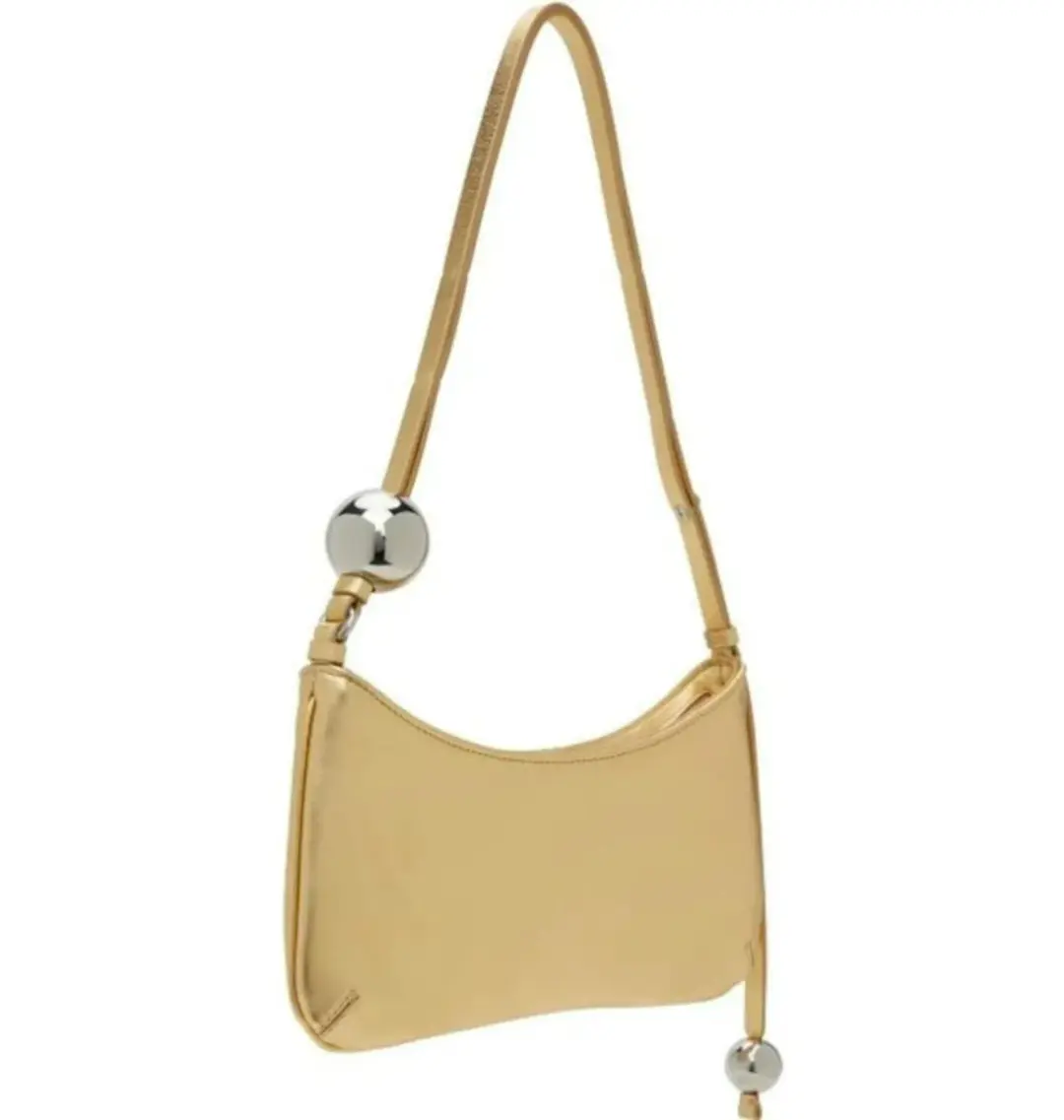 Jacquemus Le Bisou Shoulder Bag Gold for rent on The Volte - main image